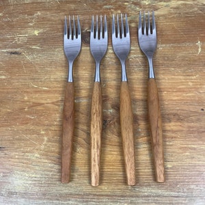 Mid Century Rare Wusthof Dreizack Rostfrei Wood Handled Stainless and Teak Utensils Forks Dessert Knives Place Spoons Teaspoons Sold n Sets