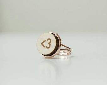Ring KL3 with engraved "<3" made of wood and rose colored metal