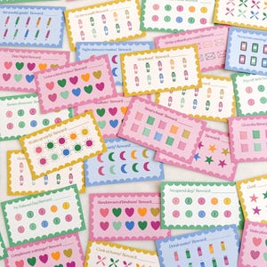 May include: A collection of colorful reward cards with scalloped edges. Each card features a different activity prompt, such as "Read a book!" or "No screen evening!" and includes space for tracking progress with hearts, stars, and other icons. The cards are in various pastel colors.
