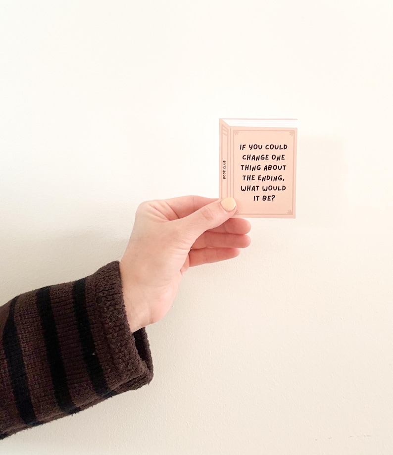 book club question prompts that are in the shape of a book