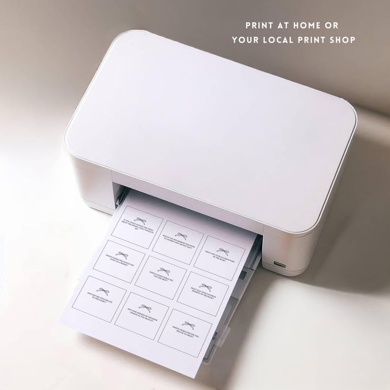 May include: A white printer with a sheet of paper coming out of the tray. The paper has a grid of 12 squares with a simple design in each square. The text "PRINT AT HOME OR YOUR LOCAL PRINT SHOP" is at the top of the image.