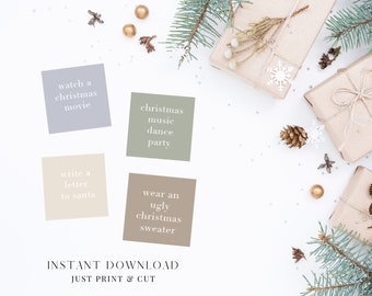 May include: Four printable Christmas activity cards with a light blue, beige, green, and brown background. The cards feature the following text: "watch a christmas movie", "write a letter to santa", "christmas music dance party", and "wear an ugly christmas sweater".