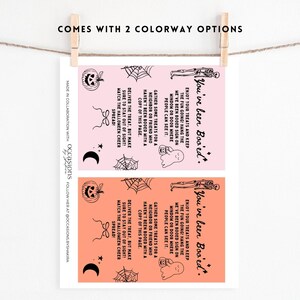 May include: Two Halloween-themed cards, each with a different color background, are displayed. The cards feature Halloween-related graphics like pumpkins, ghosts, and spiderwebs, along with the text "You've been Boo'ed." The cards are suspended by a wooden clothespin.