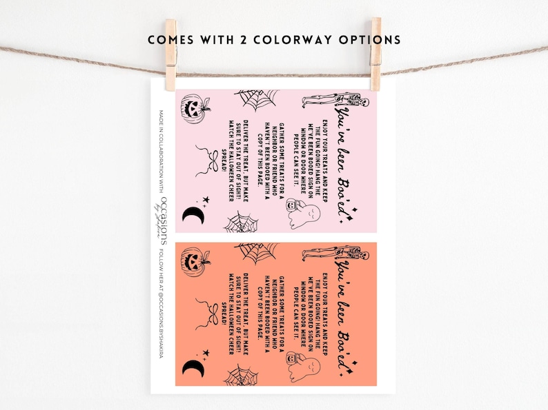 May include: Two Halloween-themed cards, each with a different color background, are displayed. The cards feature Halloween-related graphics like pumpkins, ghosts, and spiderwebs, along with the text "You've been Boo'ed." The cards are suspended by a wooden clothespin.