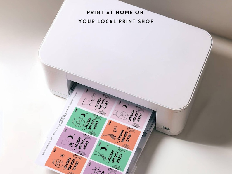 Puede incluir: Una impresora blanca imprime hojas coloridas con dise&ntilde;os de monstruos. El texto "PRINT AT HOME OR YOUR LOCAL PRINT SHOP" est&aacute; en la parte superior. Cada cuadrado de dise&ntilde;o tiene el texto "CREATE YOUR OWN MONSTER".