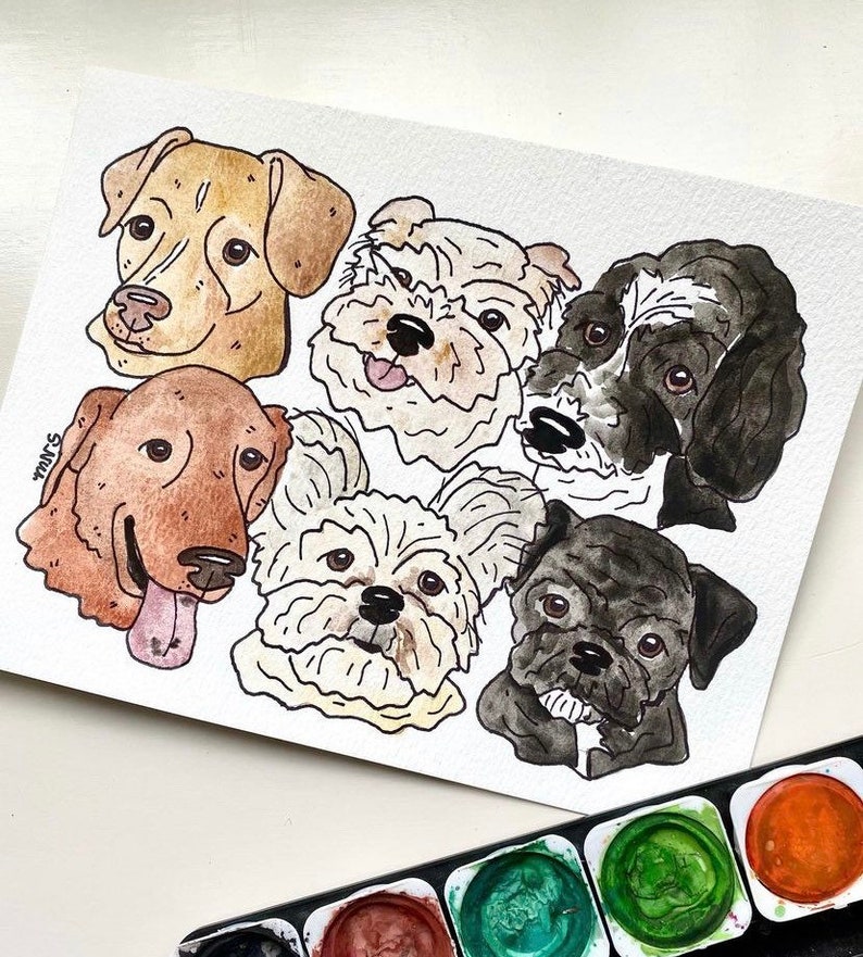 May include: Watercolor painting featuring six different dog breeds. The dogs are depicted with expressive faces and varying fur colors, including tan, brown, black, and white. The artwork is on textured paper, with a watercolor paint palette visible in the corner.
