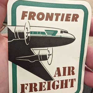 Etichetta gommata per trasporto aereo Frontier Airlines anni '60 - Vecchia e originale - Decalcomania vintage per viaggio o valigia