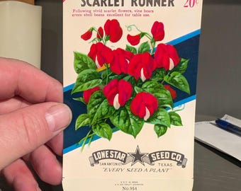 May include: Vintage seed packet for Scarlet Runner beans. The packet features a colorful illustration of the beans growing on a vine with red flowers. The text on the packet reads "Scarlet Runner 20¢" and "Lone Star Seed Co. San Antonio, Texas. "Every Seed a Plant." No. 954"