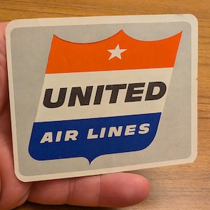 Etichetta gommata Orient United Airlines degli anni '50 NOS - Vecchia e originale - Decalcomania da viaggio o valigia vintage - Versione Wheaties
