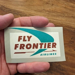 Etichetta gommata Frontier Airlines anni '60 - Vecchia e originale - Adesivo vintage da viaggio o valigia