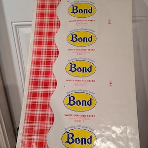 May include: Vintage advertising display for Bond White Enriched Bread. The display features six repeating panels with the Bond logo and the slogan "Bursting with good taste!" in a yellow and blue color scheme. The panels are set against a red and white checkered background.
