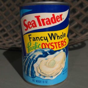 1970er Jahre Sea Trader Fancy Pacific Oysters Can altes Dosenetikett auf Dose - Safeway Stores - Oakland, Kalifornien