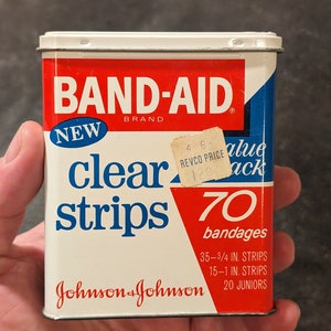 Strisce di plastica trasparenti per cerotti originali vintage degli anni '70, in latta - Johnson & Johnson vuoti