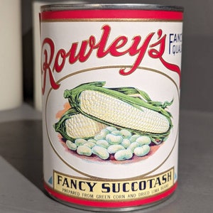 May include: A vintage can of Rowley's Fancy Succotash, prepared from green corn and dried lima beans. The can features a colorful illustration of corn and lima beans.