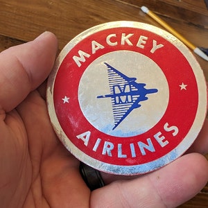 Etichetta gommata Starliners della Mackey Airways Airlines degli anni '60 - Vecchia e originale - Decalcomania da viaggio o valigia vintage