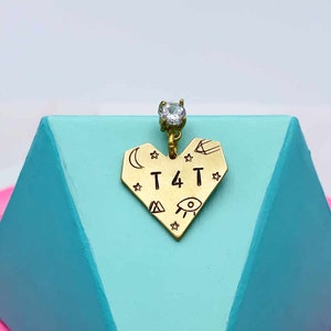 T4T earring > cubic zirconia studs w handstamped brass hearts (sold as singles)