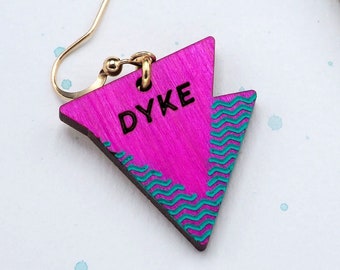DYKE earring- sapphic lesbian jewelry with pink triangles