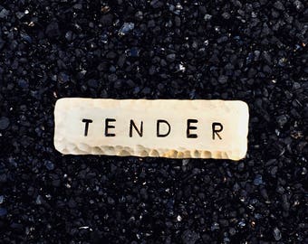TENDER pin (brass)