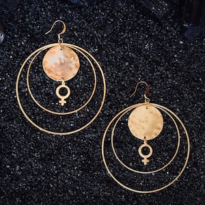 Handmade brass crescent earrings with black fan detailing. Crescent fan earrings