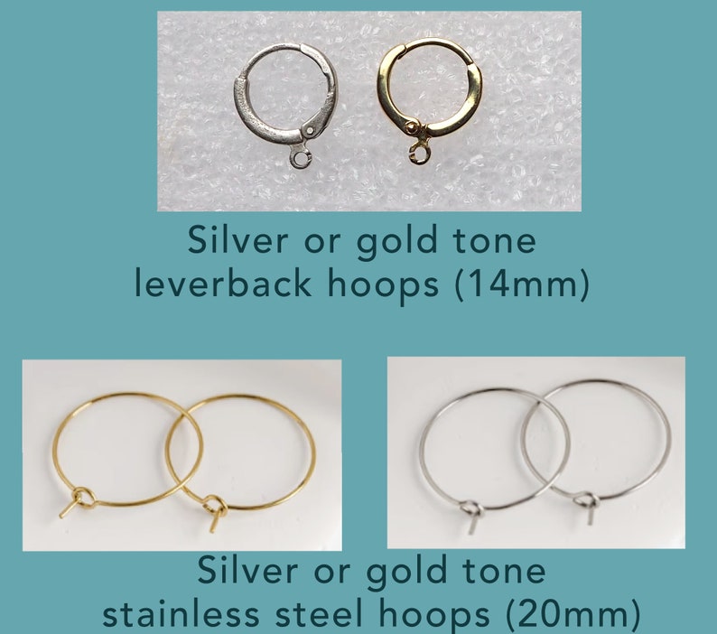 May include: Two pairs of hoop earrings, one pair is silver tone leverback hoops measuring 14mm, the other pair is gold tone stainless steel hoops measuring 20mm.