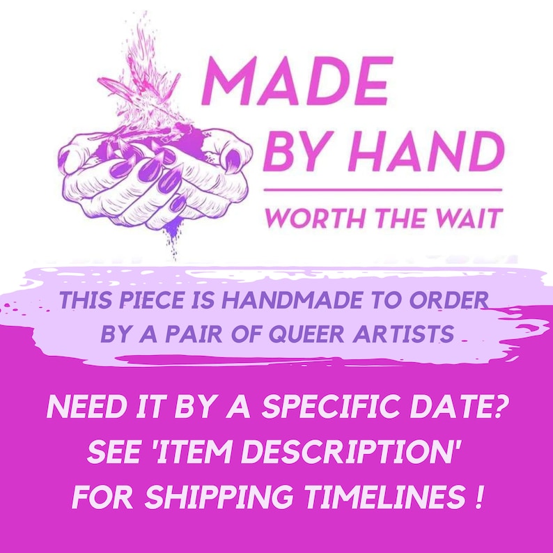May include: A graphic design with the text "MADE BY HAND WORTH THE WAIT." The image features a pair of hands holding a design with a purple and pink color scheme. The text also includes "THIS PIECE IS HANDMADE TO ORDER BY A PAIR OF QUEER ARTISTS."