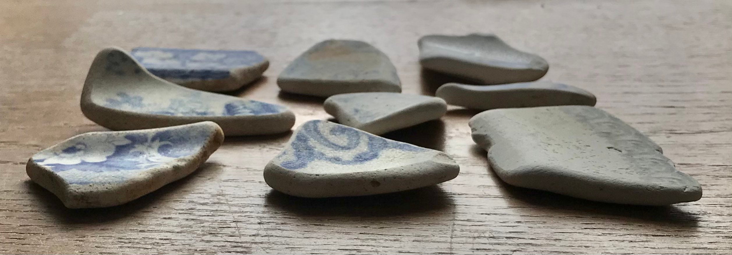 blue pottery with white figures