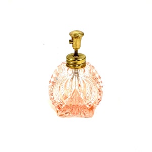 Vintage roze parfumfles