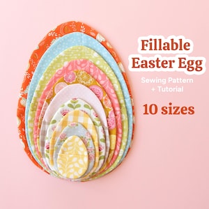May include: A stack of ten fabric Easter egg shapes in various sizes and patterns, including floral, polka dot, and gingham designs. The eggs are arranged in a nested formation against a pink background. Text reads "Fillable Easter Egg Sewing Pattern + Tutorial 10 sizes."