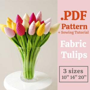 May include: A PDF pattern and sewing tutorial for making fabric tulips in three sizes: 10 inches, 14 inches, and 20 inches. The image shows a bouquet of colourful fabric tulips in a clear glass vase.