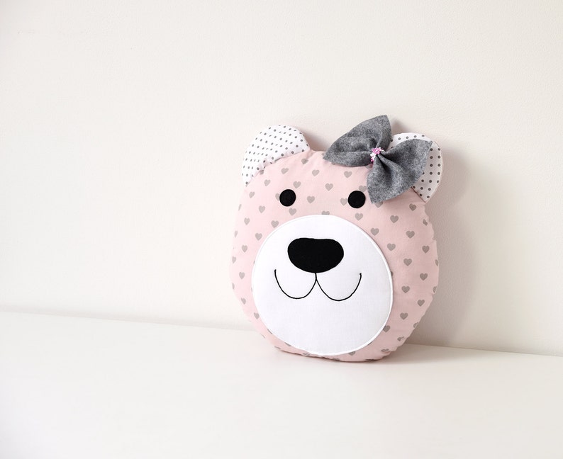 teddy bear and pillow