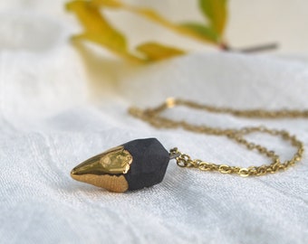 Black porcelain and 22K gold geometric pendant. Handmade ceramic necklace. Mother's day gift.