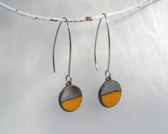 Long ceramic earrings. Orange and silver charm with surgical steel hooks. Minimalist earrings handmade in France.