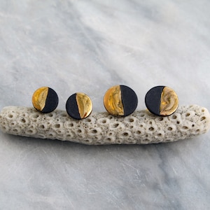 Tiny porcelain earrings black and 22K gold. Minimalist handmade ceramic circle studs . Everyday earrings.