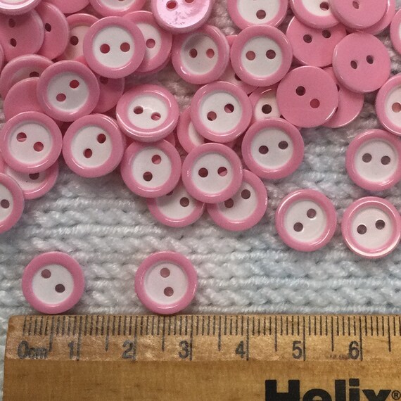 Pink and on sale white buttons