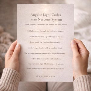 May include: A beige paper with the text "Angelic Light Codes for the Nervous System" and affirmations for calm and inner peace. The paper is held by two hands, with the text "NEW EARTH MAGIC" at the bottom.