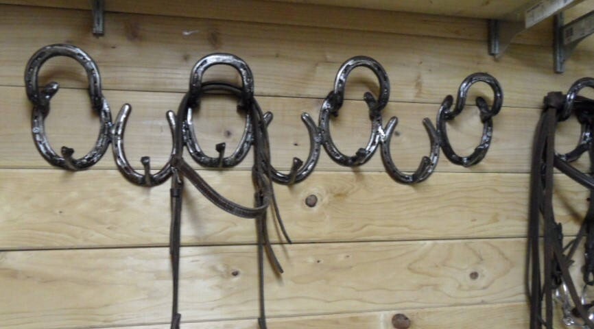 Tack Holder Rack made from used horseshoes, cleaned and painted