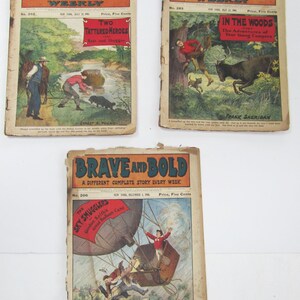 May include: Three vintage covers of the Brave and Bold weekly magazine. The covers feature illustrations of adventure stories, including "Two Tattered Heroes", "In the Woods", and "The Sky Smugglers".