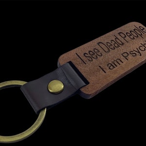 Keychain. Wood and leather.