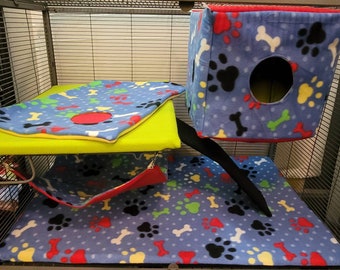 Rainbow paw print and bone design single ferret nation cage liner and bedding set