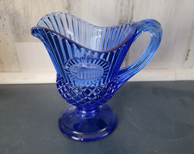 Blue White House Pitcher by Avon