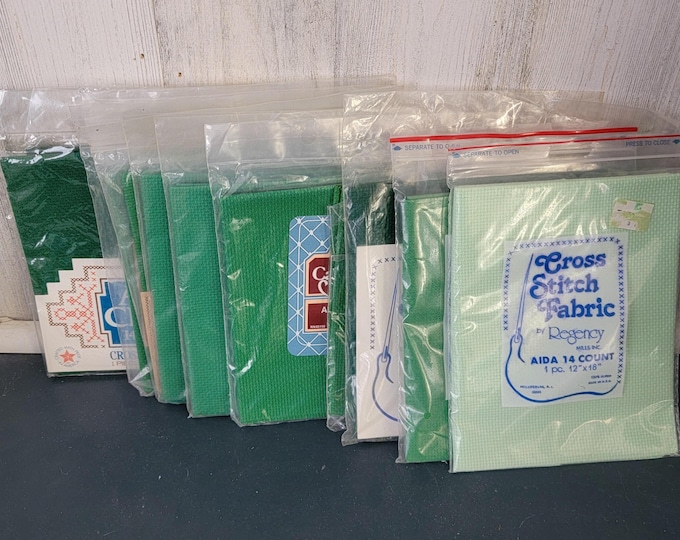Green Aida in different shades by various companies