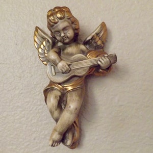 GOLD CHALKWARE CHERUB Angel With Wings Holding Guitar Or Stringed Instrument Wall Decor