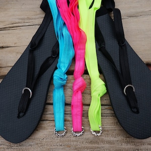 Lace Up Gladiator Sandals and 4 pairs of interchangeable laces. Black,Turquoise. Hot Pink, and Neon Green. Free Shipping in the US.