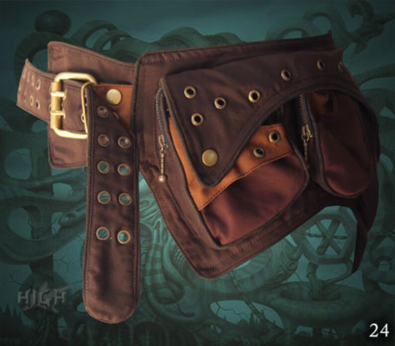 May include: A brown leather belt with multiple pockets and a buckle. The belt has a brown canvas strap with metal rivets and a zippered pocket.