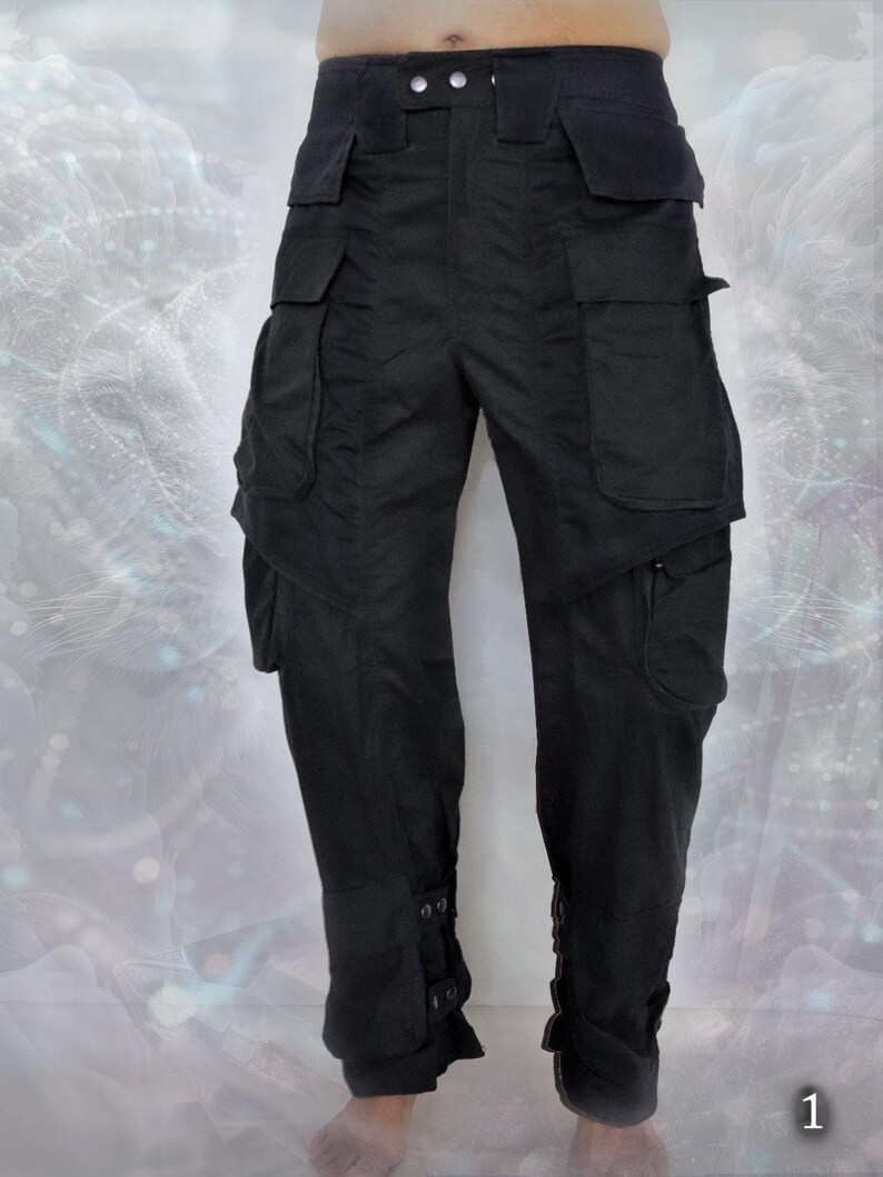May include: Black cargo pants with multiple pockets and adjustable straps at the bottom of the legs.
