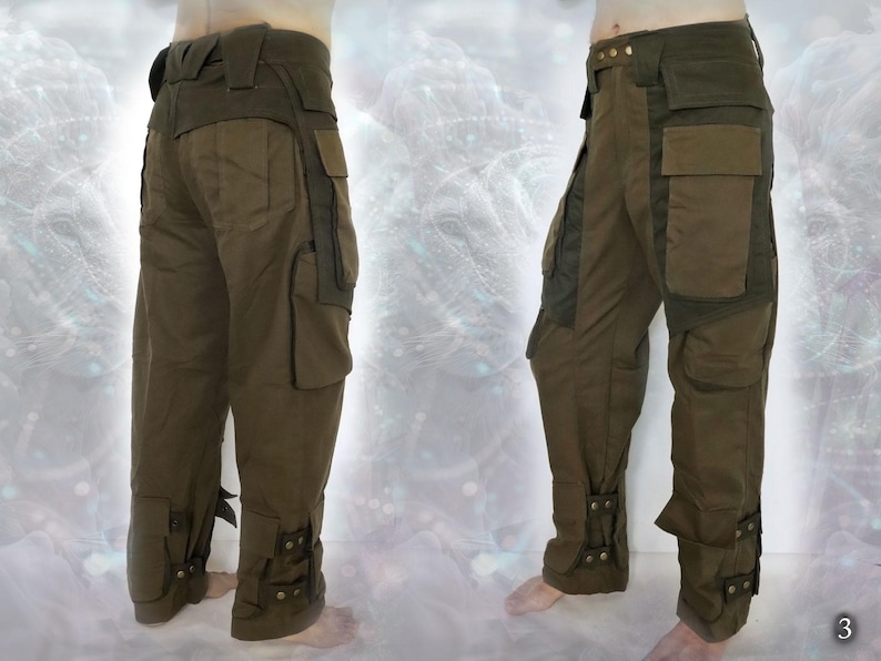May include: A pair of olive green cargo pants with multiple pockets and adjustable straps at the bottom of the legs.