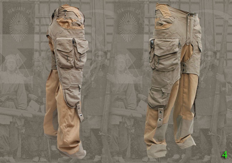 Pu&ograve; includere: Un paio di pantaloni cargo beige con pi&ugrave; tasche e un pannello marrone sulla parte inferiore delle gambe. I pantaloni hanno una tasca con cerniera sulla coscia destra e una cinghia con fibbia sulla coscia sinistra.