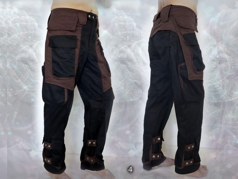 Black and brown cargo pants with multiple pockets and adjustable straps at the bottom of the legs.