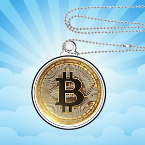 May include: A gold-colored Bitcoin pendant on a silver chain. The pendant features the Bitcoin logo and the text "Bitcoin Decentralized Digital Currency Blockchain Peer to Peer Bitcoin Decentralized Trading".