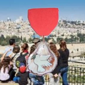 May include: A decorative medal with a red ribbon and a clear, teardrop-shaped pendant. The pendant features a white dove with an olive branch, set against a backdrop of a city with a blue sky.